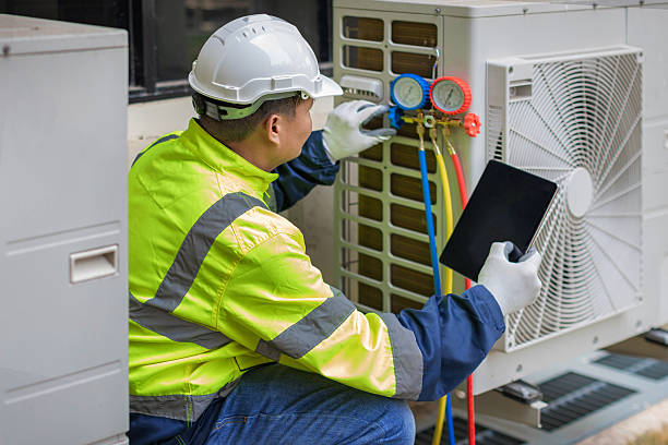 Professional Hvac Installation technician working in Wetumpka, AL